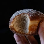 Closeup of a sourdough donut showing its fluffy texture
