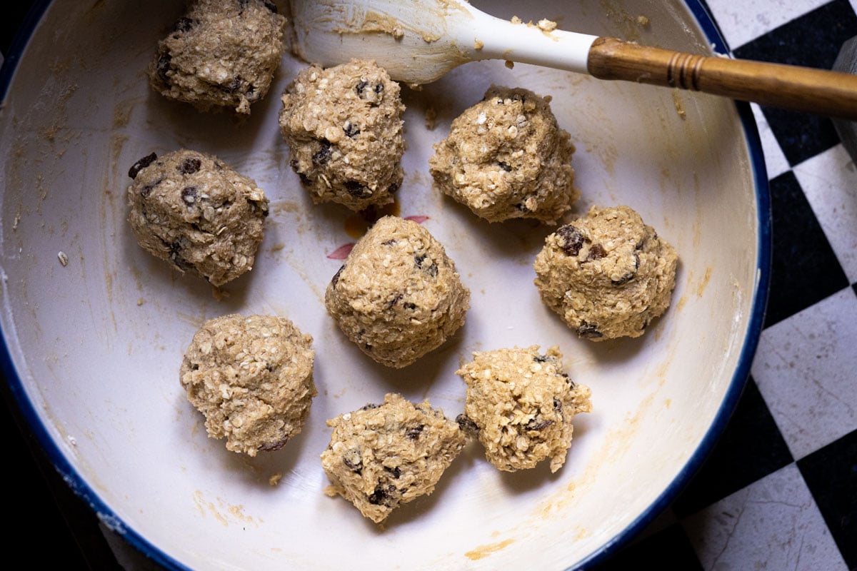 Unbaked sourdough oatmeal cookie dough rolled in balls